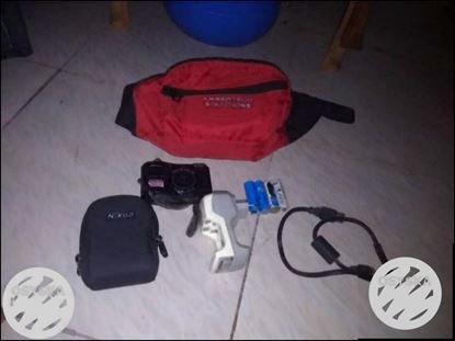 Camera ,pouch, 4charging cell ,big bag, cell