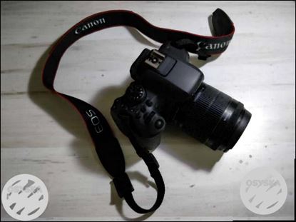 Canon EOS 750 D with 18-55mm lens.Bought last