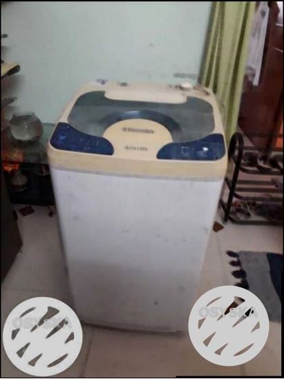 White And Beige semi automatic timar Machine