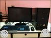 Black Computer Monitor, Keyboard, Mouse, And Tower