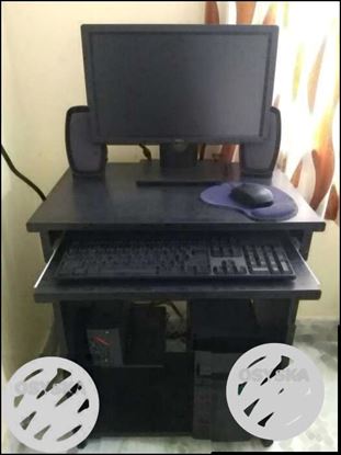 Black Computer Monitor, Keyboard, Mouse And Tower