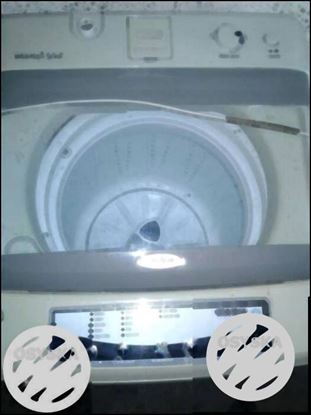 White whirlpool top load washing machine