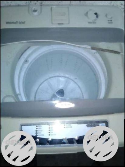 White whirlpool top load washing machine