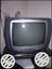 Gray CRT TV With Remote