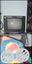 Black CRT TV With Remote