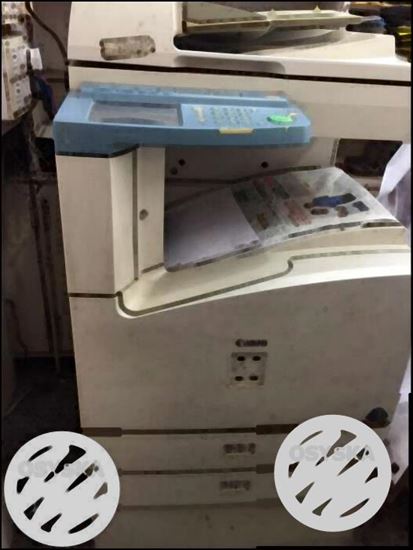 White And Blue Canon Photocopier Machine