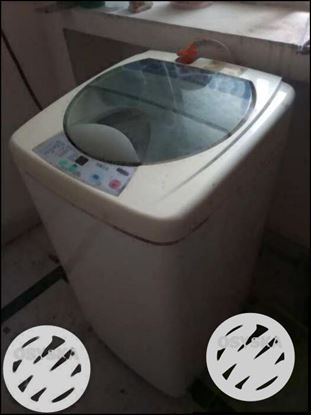 Washing machine.. up fully automatic .. excellent