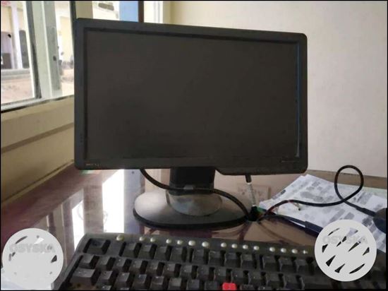 Black Flat Screen Computer Monitor And Keyboard