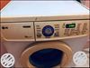 LG White And Gray Front-load Washing Machine