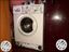 IFB White Front-load washing machine.