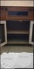 Brown Wooden TV Hutch With Flat Screen Television