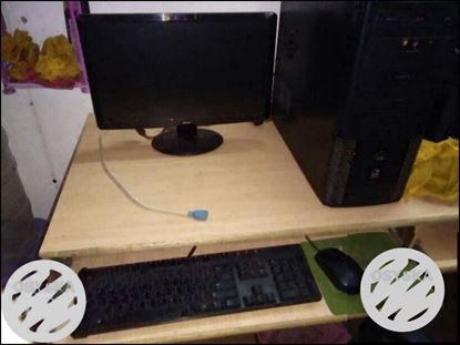 Black Computer Monitor, Keyboard, Mouse And Tower