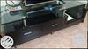 Black Wooden TV Stand With Flat Screen TV