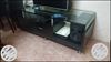 Black Wooden TV Stand With Flat Screen TV