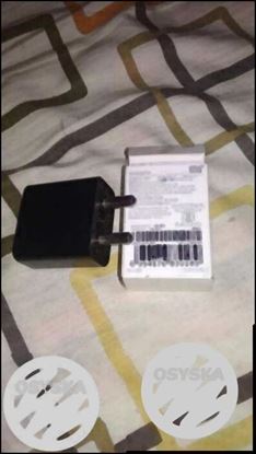 Mi original charger. Standard 5v 2amp. Urgent