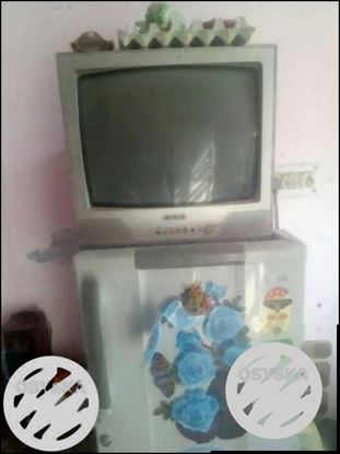 Gray CRT Television With Remote