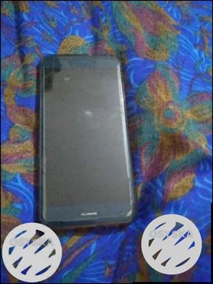 Hawaii phone 4Gb RAM ..32Gb memory 1year old okk