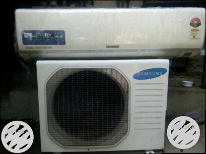White Samsung Split-type And Outdoor AC Units