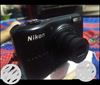Black Nikon Coolpix Point-and-shoot Camera