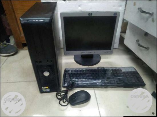 Black Flat Screen Computer Monitor And Black Computer Tower