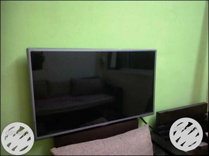Flat Screen LG TV with wall stand