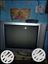 Gray CRT Television With Remote